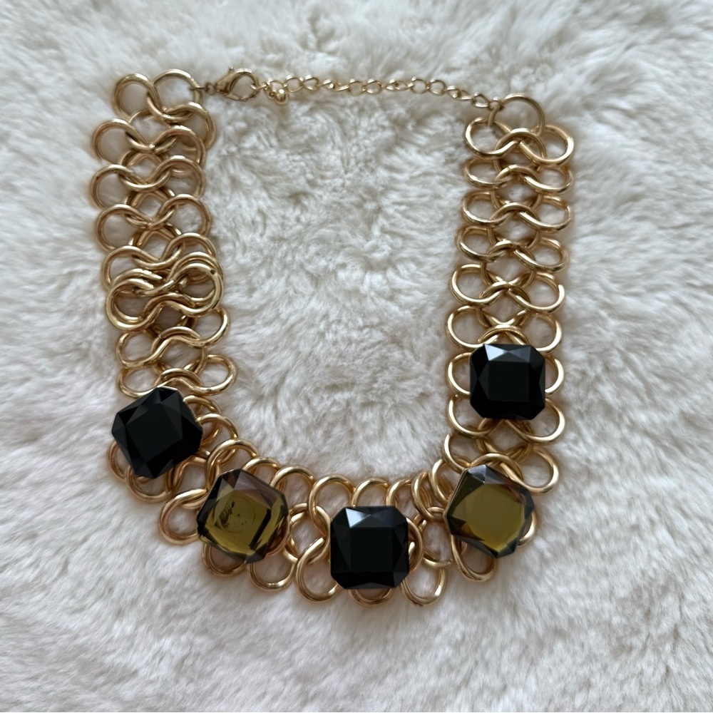 Women large gold necklace with green crystals